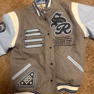Smoke rise Tm varsity jacket grey/Unc blue rhinestone